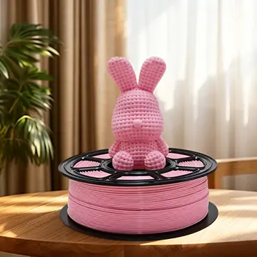 Pink PETG filament with printed rabbit model