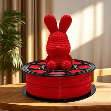 Red PETG filament with printed rabbit model